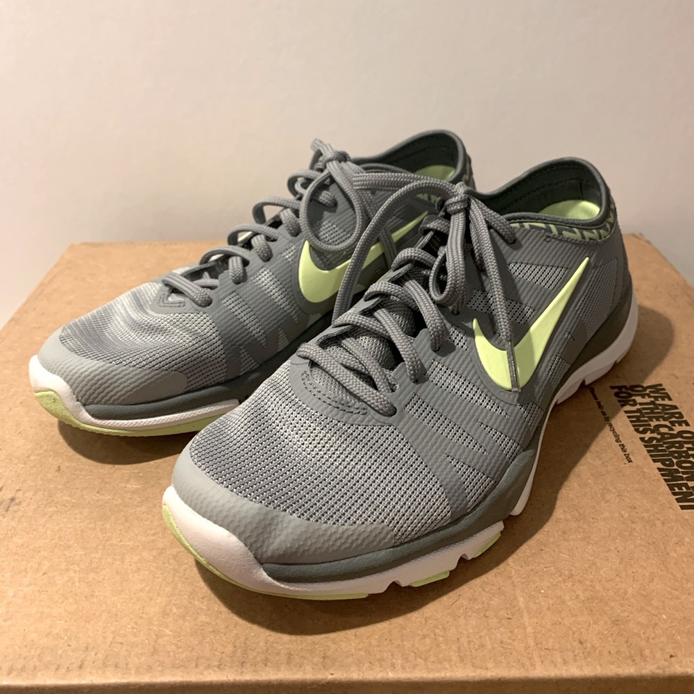 Nike gray sneakers with yellow/greenish trim